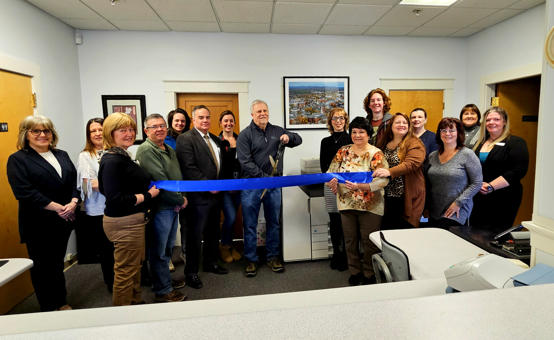 Chamber of Commerce holds ribbon-cutting for John Gisis Photography