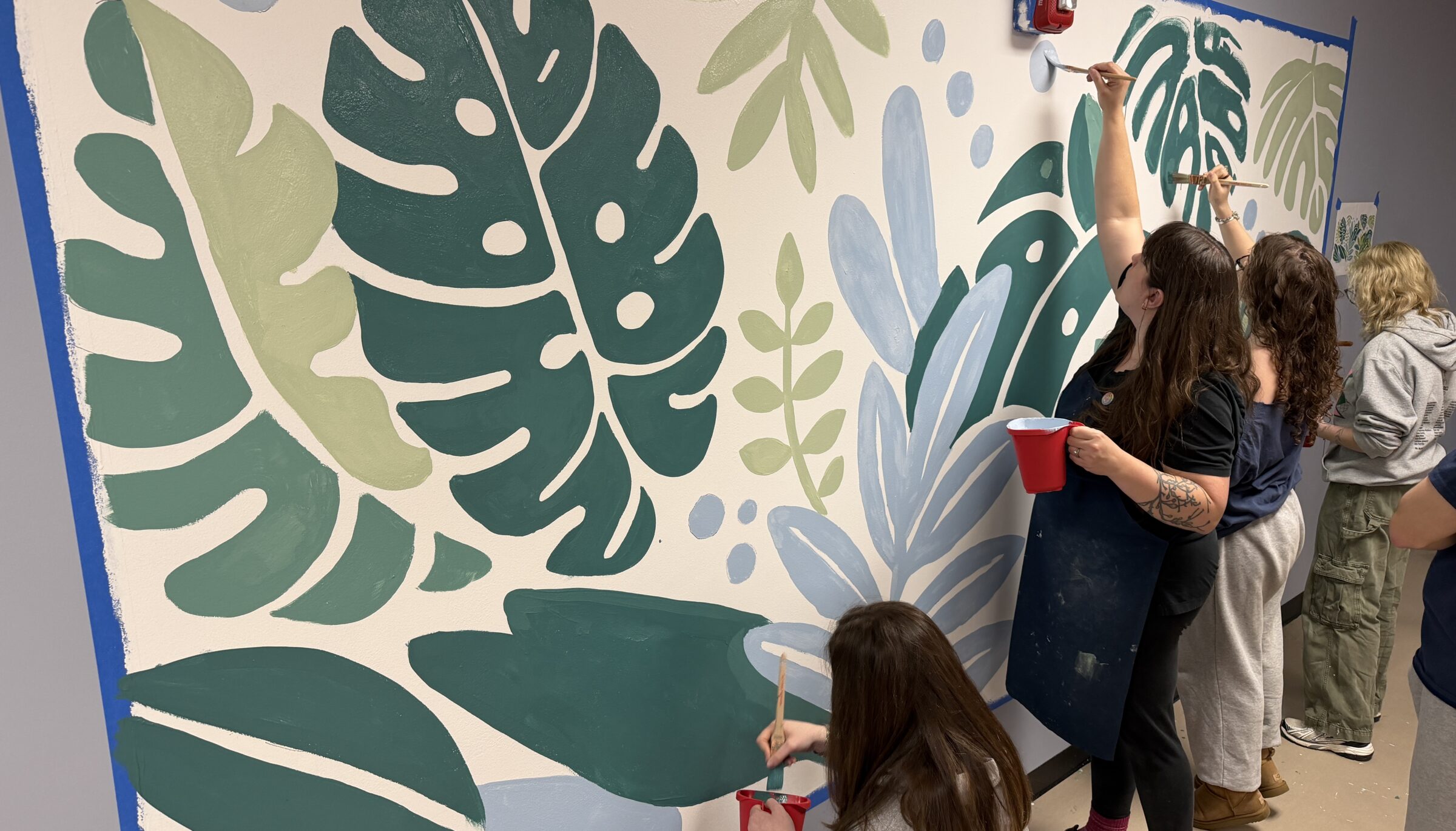 Intergenerational Collaboration Brings New Mural to Rochester Senior Activity Center